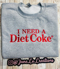 I need a Diet Coke embroidered sweatshirt. Cozy sweatshirt with a mini Diet Coke embellishment on the sleeve