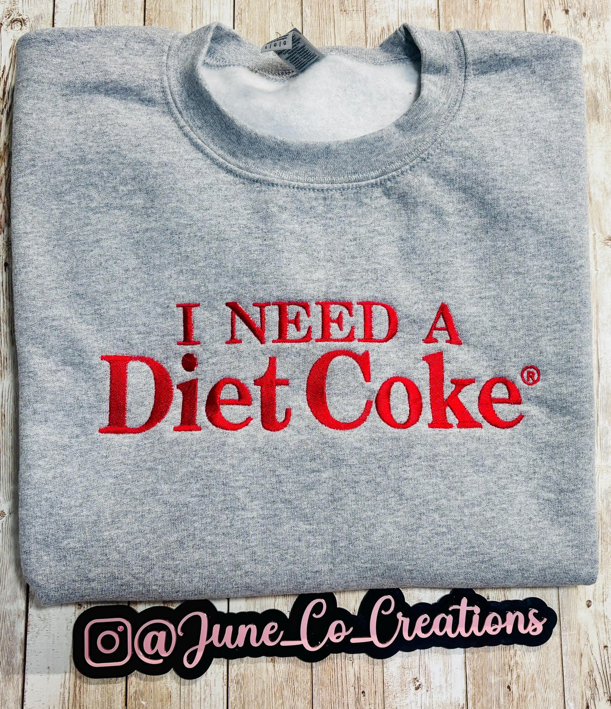 I need a Diet Coke embroidered sweatshirt. Cozy sweatshirt with a mini Diet Coke embellishment on the sleeve