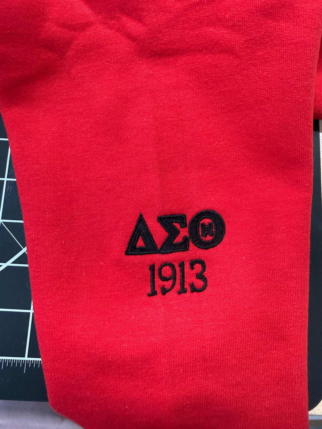 Delta Theta Sigma Embroidered Sweatshirt with Sleeve Embellishments