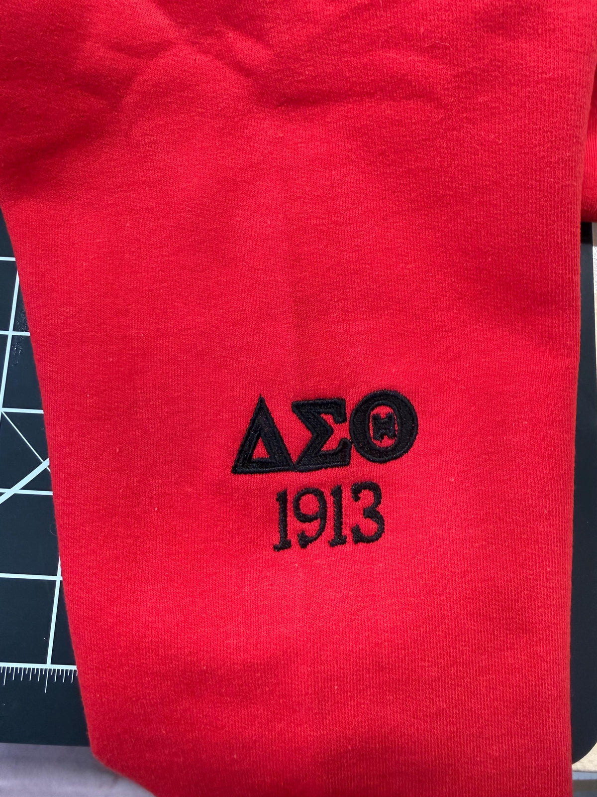 Delta Theta Sigma Embroidered Sweatshirt with Sleeve Embellishments