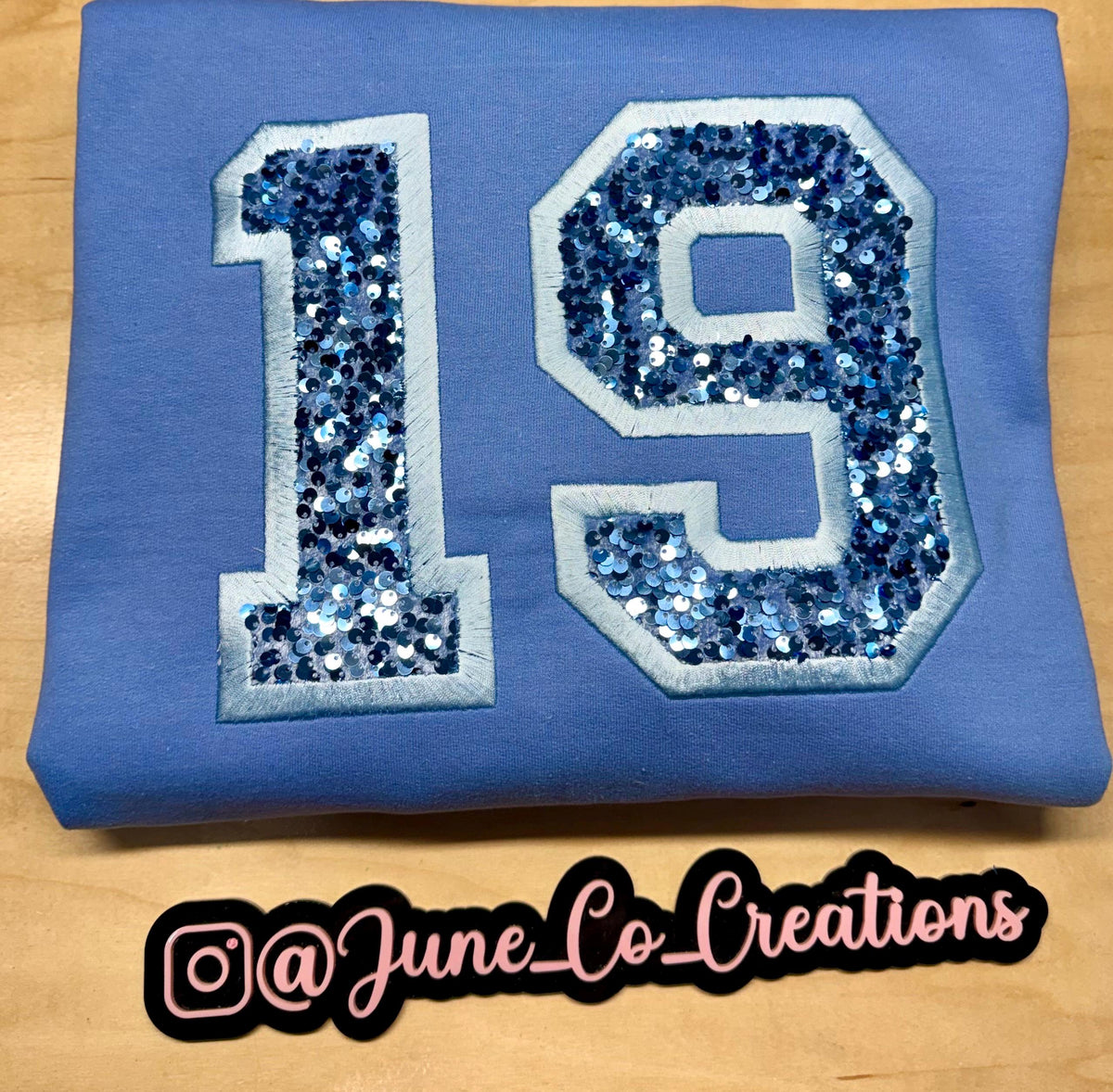 Sport team number sequin embroidered sweatshirt.
