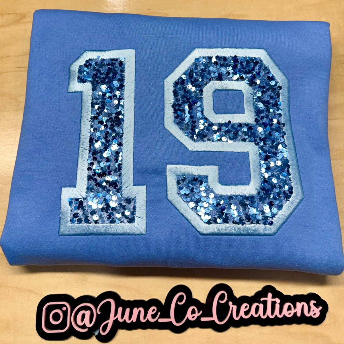 Sport team number sequin embroidered sweatshirt.