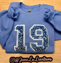 Sport team number sequin embroidered sweatshirt.