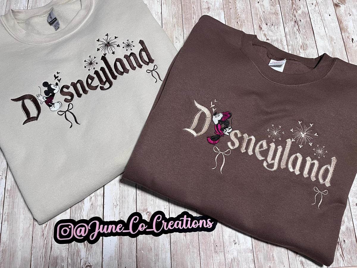 Disneyland Cozy embroidered Sweatshirt. Featuring Disney classic icons. All the things you love Disney.