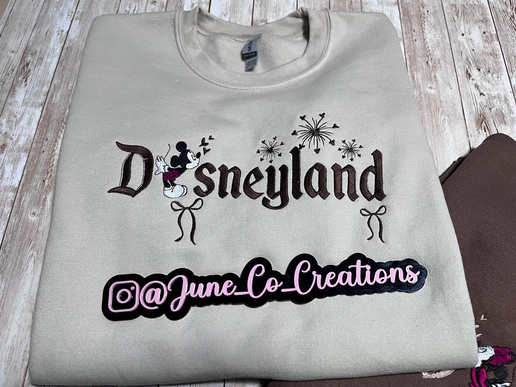 Disneyland Cozy embroidered Sweatshirt. Featuring Disney classic icons. All the things you love Disney.