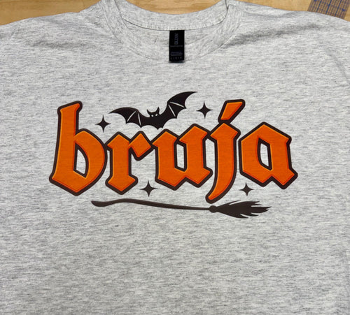 Bruja “Witch” spooky season tshirt. Broom and Bats this made to order tshirt is perfect for fall.